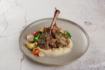 Herb Crusted Rack of Lamb with Mashed Potatoes and Roasted Vegetables