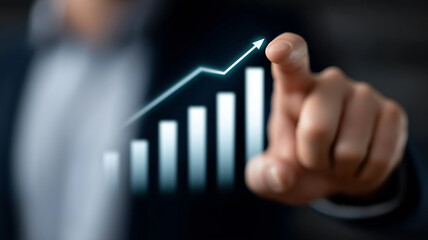 Futuristic Businessman Hand Overlaying Glowing Holographic Bar Graph in Neon Blue and Green with Rising Profits, Financial Growth, and Digital Data Grid Background Representing Investment Technology