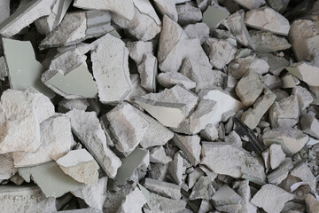 Broken concrete, Piles of lightweight construction bricks after house demolition