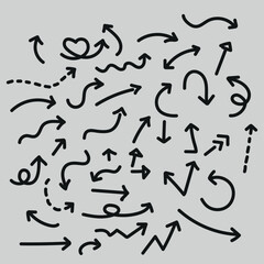 Set of hand-drawn black arrows in different styles on white background, doodle sketch arrows collection