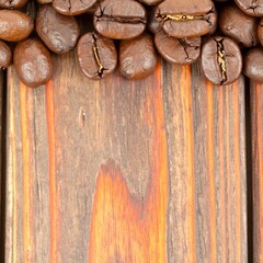 Roasted Coffee Beans on Rustic Wooden Surface