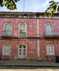 View of modern and historic buildings in the center of Silves, Algarve region, Portugal.