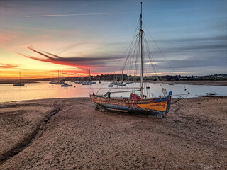 Beautiful Portuguese traditional fishing boats in the marina of Alvor town in Portugal