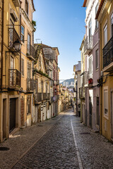 Narrow street Travesia Porta do Sol in the old town of Setubal in Portugal
