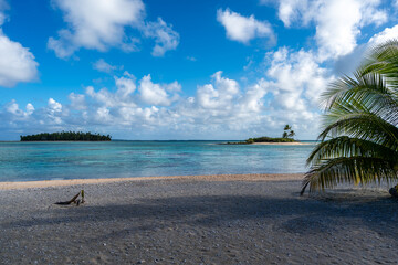 Tropical motus in Tikehau, French Polynesia, with clear lagoon waters