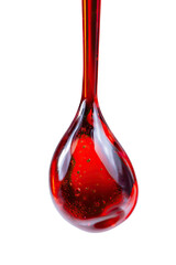 A vibrant, red liquid droplet hangs suspended in mid-air, the fluid appearing viscous and translucent with internal reflections
