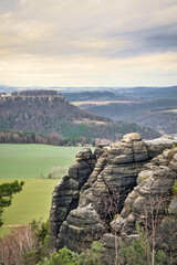 Majestic rocky landscape with a sweeping view of the wooded valley. Nature photo