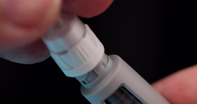 Close shot of semaglutide pen with hypodermic needle, symbolizing diabetes therapy, medication, and pharmaceutical care.