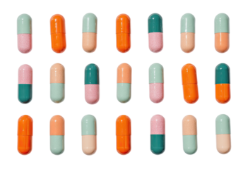Arranged pills in a grid, featuring orange, light peach, and teal colors