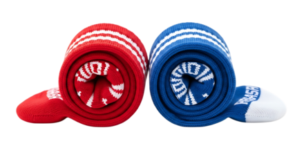 Rolled pair of red and blue striped athletic socks isolated on transparent background, perfect for sports, gym workouts, and comfortable casual wear in cold weather