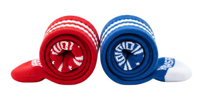 Rolled pair of red and blue striped athletic socks isolated on transparent background, perfect for sports, gym workouts, and comfortable casual wear in cold weather