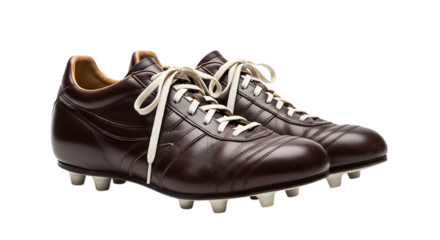 Pair of brown leather soccer shoes isolated on transparent background, showcasing vintage style and classic design for athletic performance and competitive play
