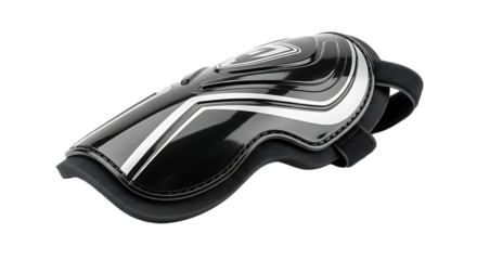 Close up of a black and white shin pad isolated on transparent background, designed for protection during sports like soccer or football, ensuring safety for the players leg