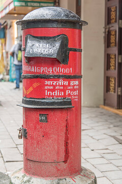 Mumbai, Maharashtra, India. August 14, 2025. Indian post box, A red letter box from the India Post, Red India Post mail box