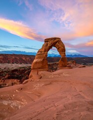 Iconic sandstone arch at sunset