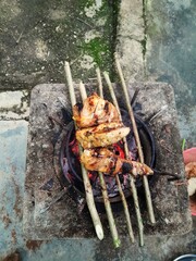 Grilled chicken on the grill 