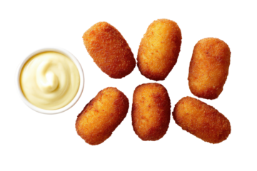 Crispy, golden-brown croquettes arranged around a small bowl of creamy dipping sauce