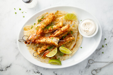 Shrimp skewers with fresh lime