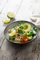 Couscous bowl with avocado and pepper sauce
