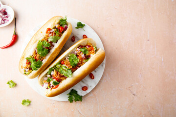 Hot dogs with red pepper and cilantro