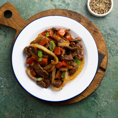 Beef casserole with vegetables and basil
