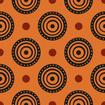 Dotted concentric circles in a mud cloth inspired seamless pattern