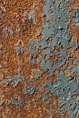 Peeling paint on an old railway carriage with rust