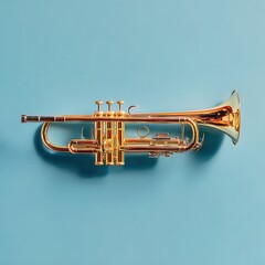 Obraz premium Gold trumpet on a light blue background. Studio shot.