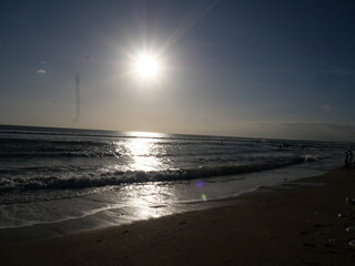 Bali’s sunset displays vibrant colors over the ocean, creating unforgettable, peaceful, and romantic moments daily.