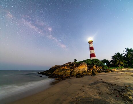 Watchtower for boats & ships on coastal India during night with milkyway seen on the backdrop.
