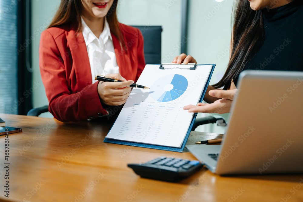 Poster business documents on office table with smart phone and calculator digital tablet and graph business