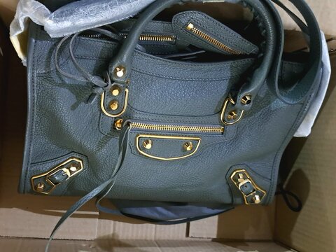 Expensive leather bag in box