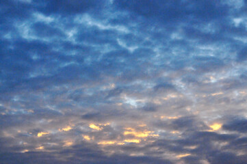 Beautiful storm clouds on a summer night with pinks and blues.