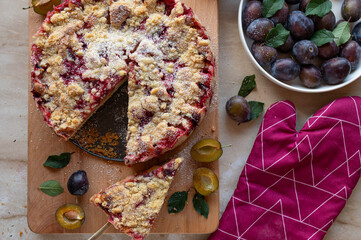 Delicious plum crumble cake - german streusel pie  fresh and homemade baked