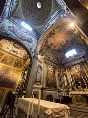 Obraz premium Religious frescoes adorning ceiling and walls of Badia di Passignano abbey church, revealing artistic mastery within Tuscan landscape, highlighting medieval spiritual heritage