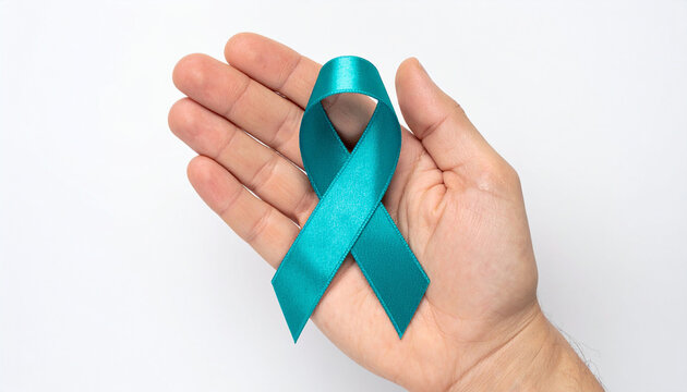 Hand holding teal awareness ribbon. Ovarian Cancer Awareness. Sexual Assault Awareness