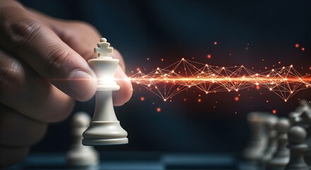 Hand moving the king chess piece representing strategic planning and decision making.