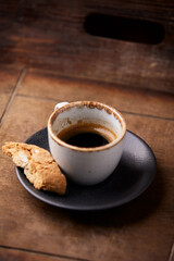 Cup of coffee on wooden background. Soft focus. Copy space