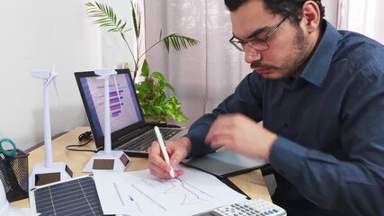 Analyst Documenting Trends by Writing on a Line Graph Report. - Powered by Adobe