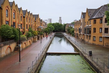 Ornamental Canal in Wapping district of London, UK. Rainy weather.