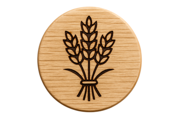 Engraved wheat sheaf symbol on a round wooden token. Rustic agriculture icon PNG clip art on a transparent background for a bakery logo, farm branding, or natural product packaging.