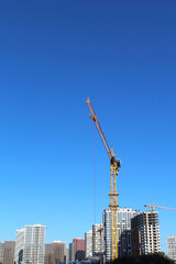 construction site with cranes, construction of new buildings in the city