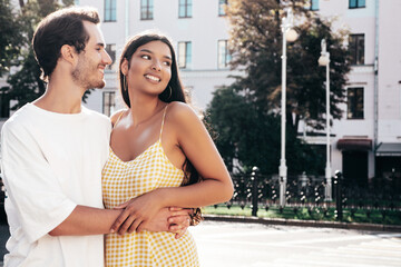 Smiling beautiful woman and her handsome boyfriend. Happy cheerful family. Sexy couple posing in...