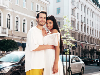 Smiling beautiful woman and her handsome boyfriend. Happy cheerful family. Sexy couple posing in...