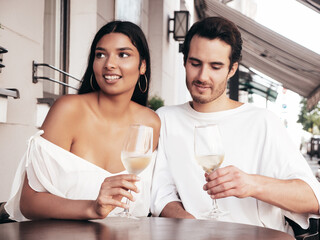 Smiling beautiful woman and her handsome boyfriend. Happy cheerful family. Sexy couple cheering...