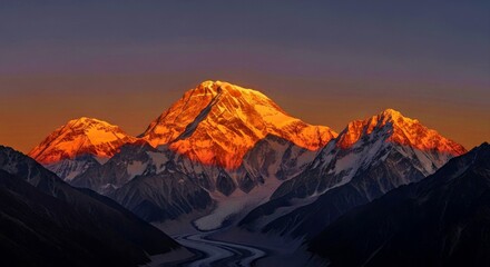 Naklejka premium Makalu at sunset, deep orange and purple hues.