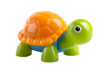 Cute green and orange toy turtle isolated on transparent background