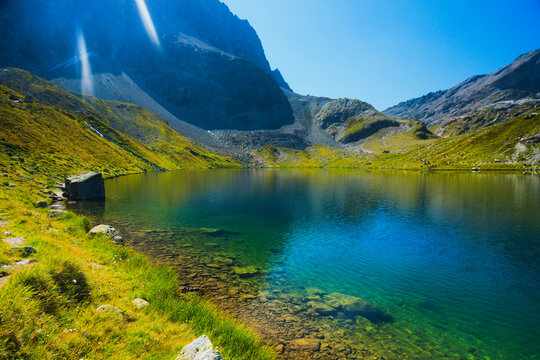 Vivid colors of the Alpine lake Leg Grevalsalvas, near the Julier Pass, Canton Graub&uuml;nden, Switzerland