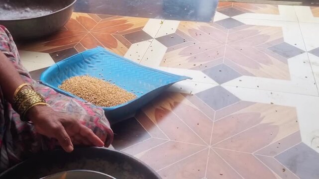 Muram (Sulavu/Soop) is a traditional winnowing tray, usually bamboo or palm, used to clean grains by separating lighter impurities from heavier grains through the ancient process of winnowing,in india