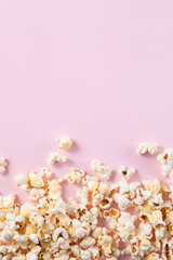 Popcorn isolated on pink background	